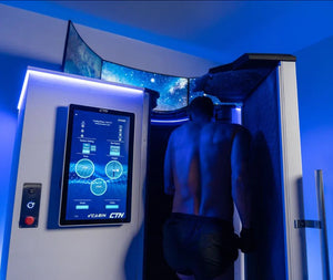 A customer getting into our electric Cryotherapy chamber for weight loss, anti aging, and for less pain and inflammation.