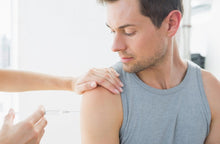 Load image into Gallery viewer, A male customer receiving a Vitamin B injection which has numerous benefits including boosting your energy and metabolism.